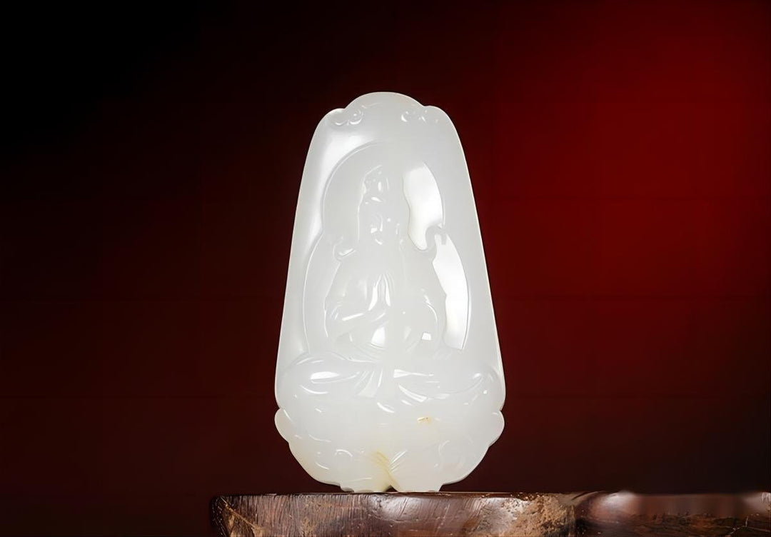 An exquisite piece of white Hetian Jade jewelry on silk, symbolizing purity and protection from Lydazz.