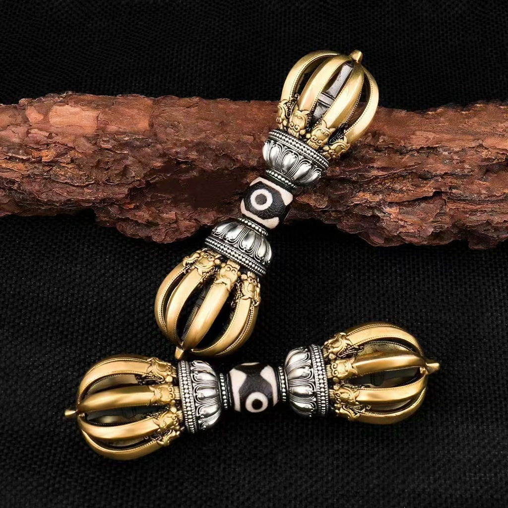 The Vajra, or Dorje, is a sacred ritual object in Tibetan Buddhism, symbolizing the indestructible, diamond-like nature of enlightened wisdom and the power to cut through ignorance. In personal practice, it is a tool for spiritual protection and mental clarity. People wear or carry a Vajra symbol to cultivate inner strength, dispel negative energies, and anchor a focused, resilient state of mind in daily life.
