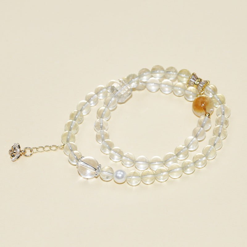 Abundance Duo Crystal Stackable Bracelet - Clarity &amp; Success - Staged shot of citrine and white crystal bracelet