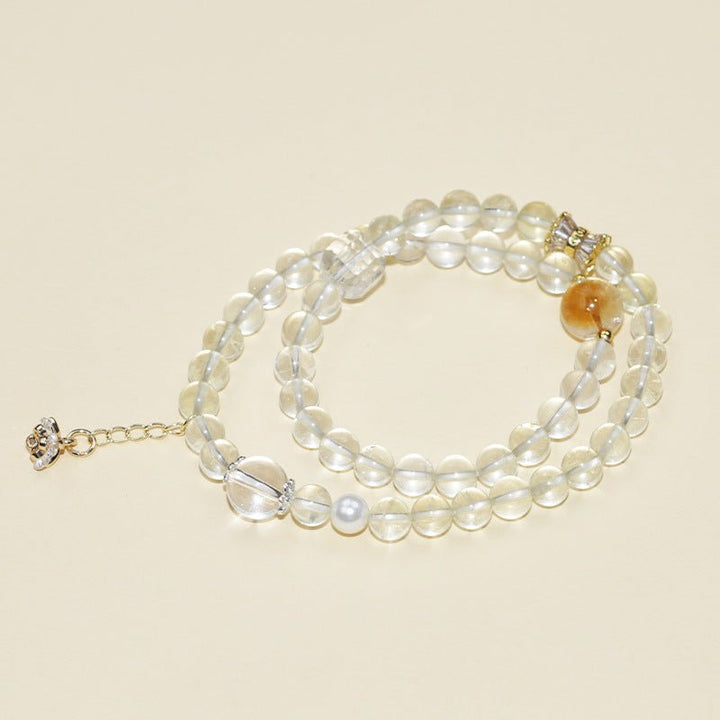 Abundance Duo Crystal Stackable Bracelet - Clarity &amp; Success - Staged shot of citrine and white crystal bracelet