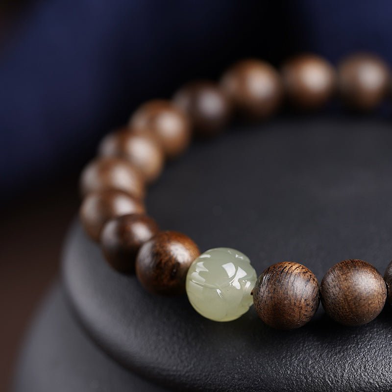 Agarwood & Lotus Blossom Nephrite Jade Bracelet - Harmony & Purity - close up shot