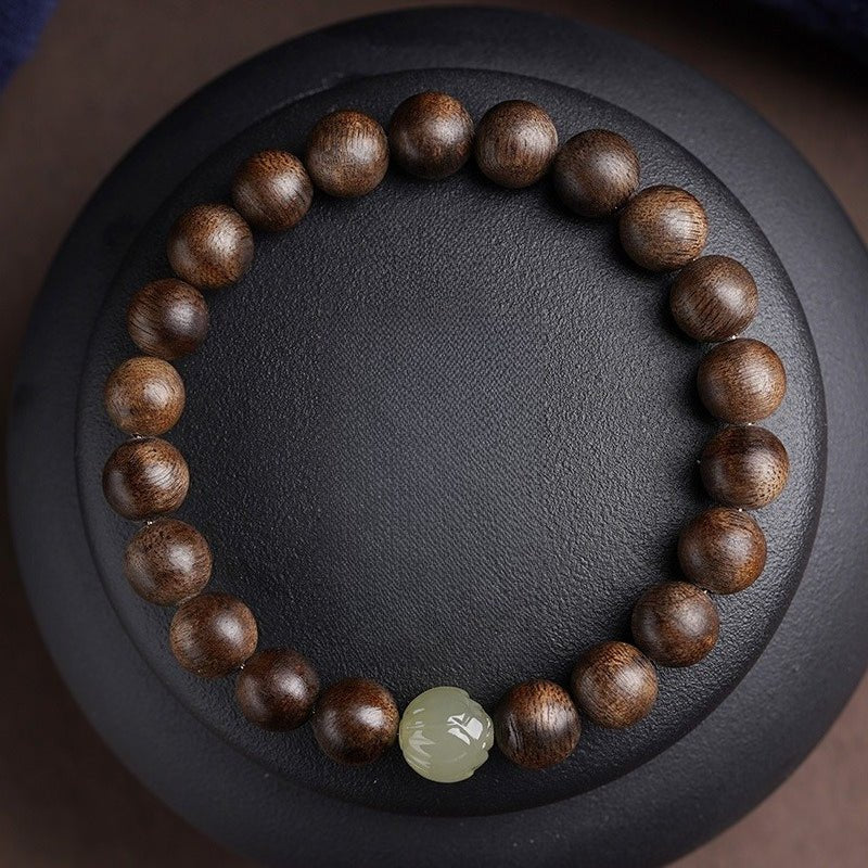 Agarwood & Lotus Blossom Nephrite Jade Bracelet - Harmony & Purity - top view shot