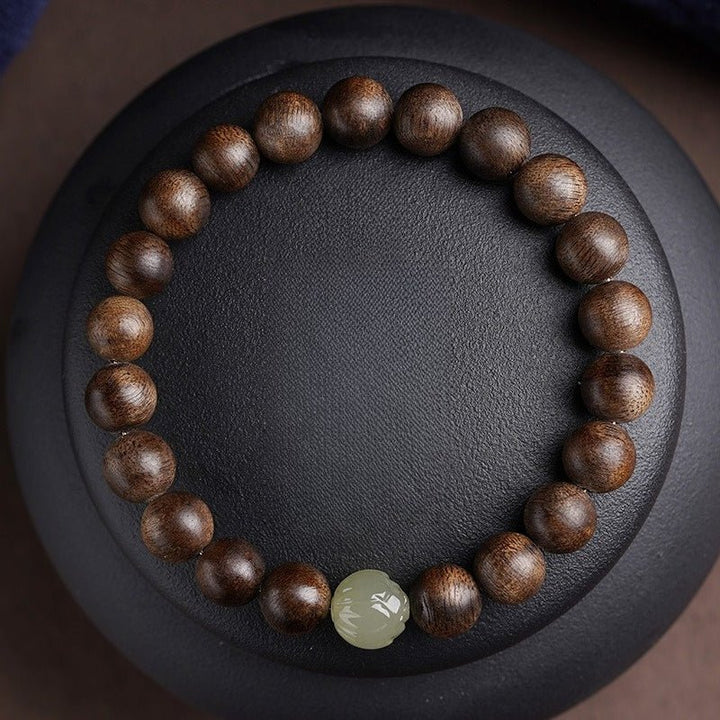 Agarwood &amp; Lotus Blossom Nephrite Jade Bracelet - Harmony &amp; Purity - top view shot
