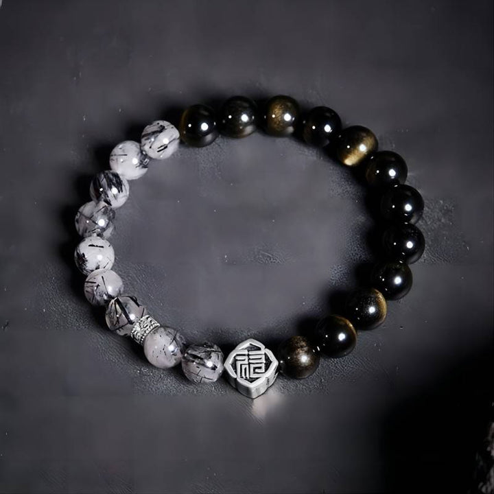 Black Obsidian &amp; Black Rutilated Quartz Bracelet  Protection • Grounding • Clarity - top view stgaged shot