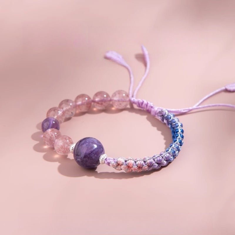 Calm Connection Braided Charm Bracelet - Good Fortune &amp; Harmony -  Staged shot of strawberry quartz braid bracelet