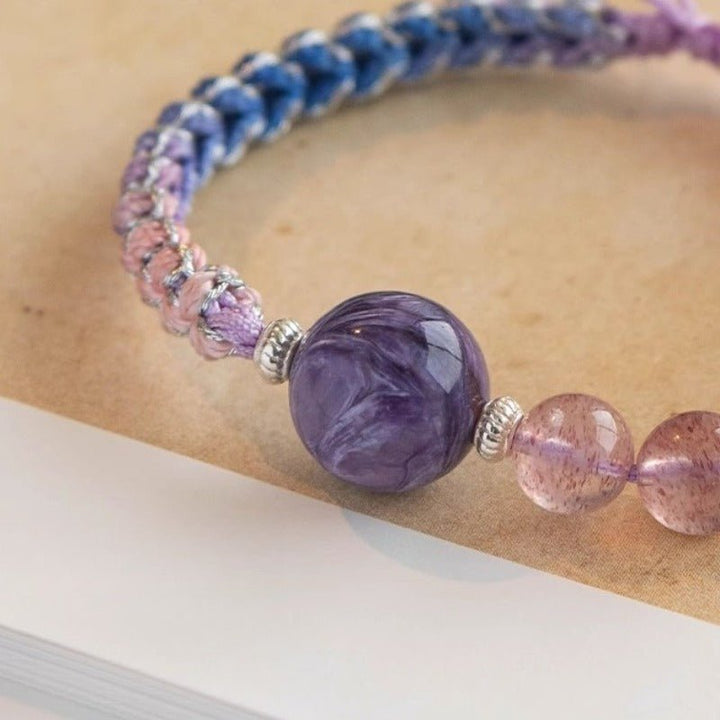 Calm Connection Braided Charm Bracelet - Good Fortune &amp; Harmony - Close up master bead shot of strawberry quartz braid bracelet