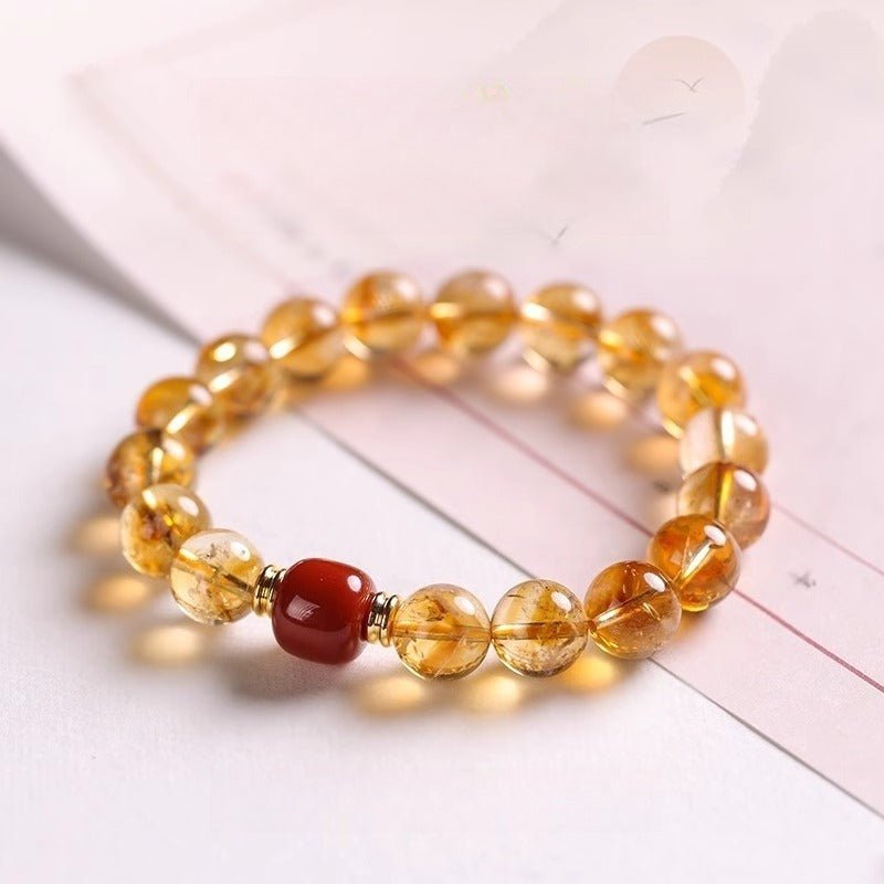 Citrine & Red Agate Wealth Bracelet - Prosperity & Positive Energy - Prop styling shot