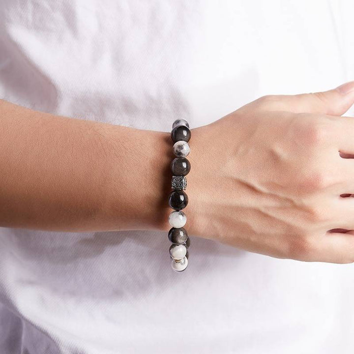 Feng Shui Yin Yang Bagua Charm Bracelet - on-wrist wearing display shot with black obsidian and blue tiger eye beads