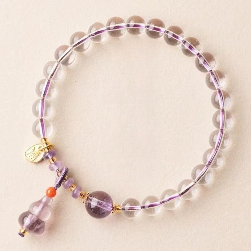 Fortune Gourd Amulet Bracelet - Clarity & Balance - Stage shot of white crystal bracelet