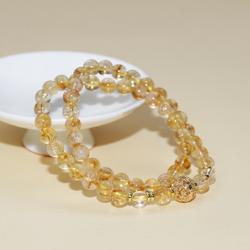 Golden Abundance Double Wrap Citrine Bracelet - Success & Vitality - Prop styling shot
