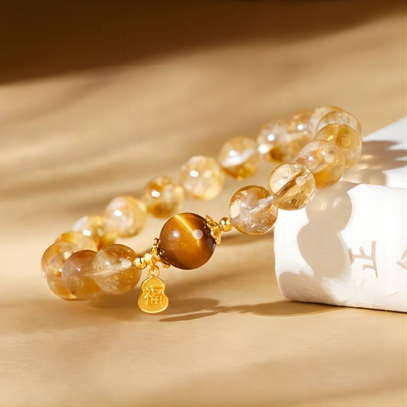 Golden Citrine &amp; Tiger Eye Bracelet With Blessing Charm - side view staged shot
