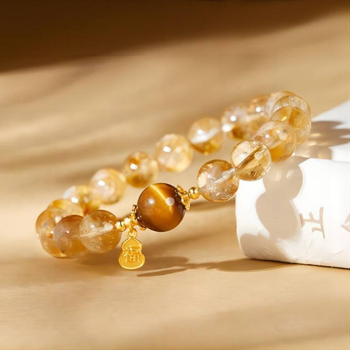 Golden Citrine &amp; Tiger Eye Bracelet With Blessing Charm - side view staged shot