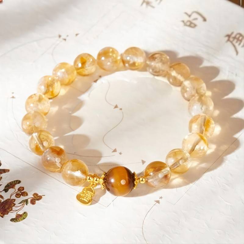 Golden Citrine & Tiger Eye Bracelet With Blessing Charm - top view staged shot
