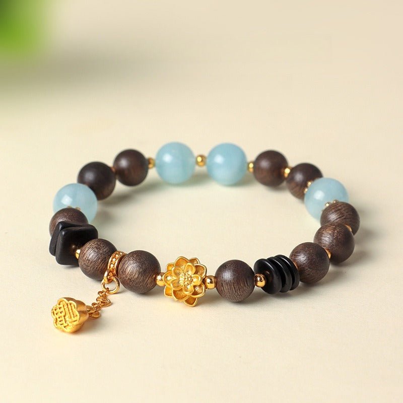 Golden Lotus Charm Agarwood & Aquamarine Beads Bracelet - Purity • Clarity • Serenity - front view2