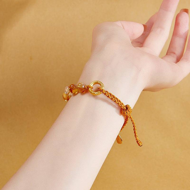 Golden Prosperity Knot Citrine Braided Cord Bracelet With Peace Buckle - on-wrist wearing display
