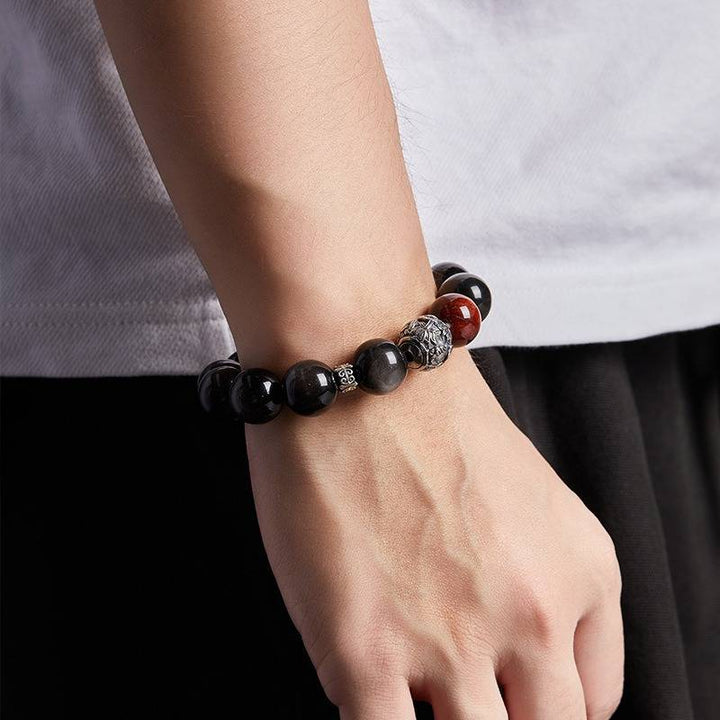 Grounded Confidence Bead Bracelet - On-wrist wearing display with black obsidian tiger eye and volcanic stone