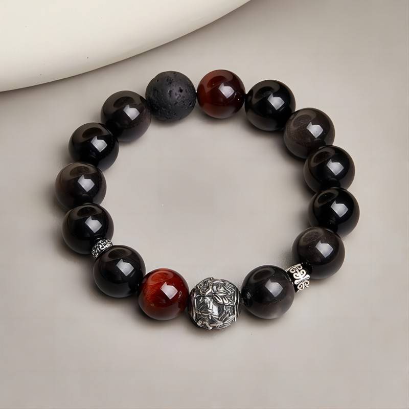 Grounded Confidence Bead Bracelet - Clarity & Resilience - Staged shot with black obsidian tiger eye and volcanic stone