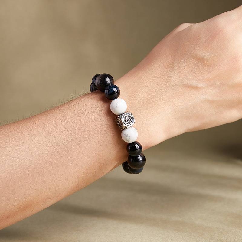 Grounded Confidence Bead Bracelet - Protection &amp; Serenity - On wrist wearing display of black obsidian bracelet