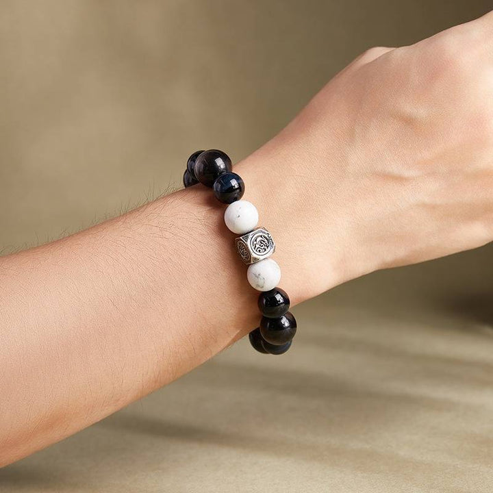 Grounded Confidence Bead Bracelet - Protection &amp; Serenity - On wrist wearing display of black obsidian bracelet