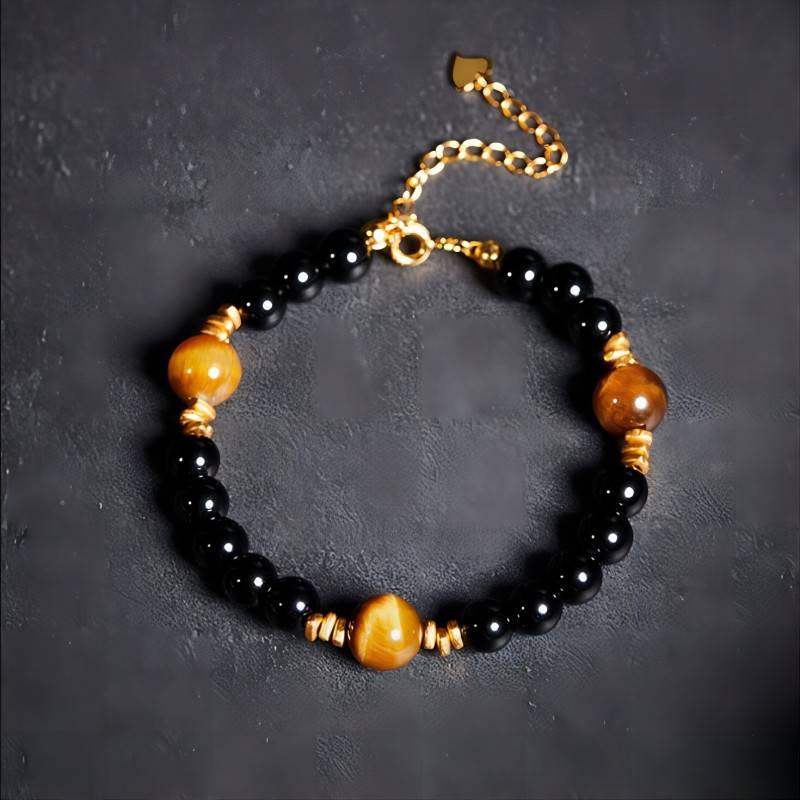 Grounded Confidence Black Obsidian And Tiger Eye Bead Bracelet - Wealth &amp; Protection - top view staged shot