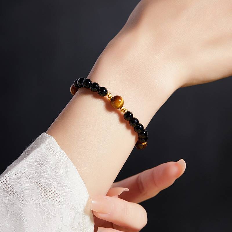 Grounded Confidence Black Obsidian And Tiger Eye Bead Bracelet - Wealth &amp; Protection - on-wrist wearing display