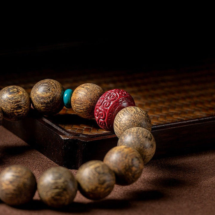 Grounded Confidence Bead Bracelet - Wisdom &amp; Protection - close up shot of agarwood beads
