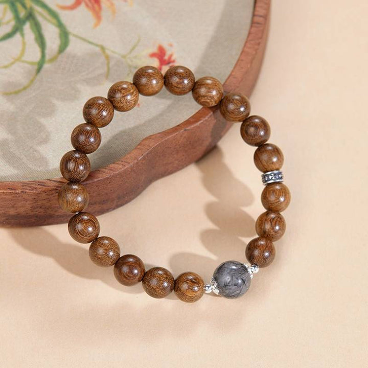 Grounded Confidence Sandalwood Bracelet - Clarity • Spirituality • Harmony - prop-styled shot 1