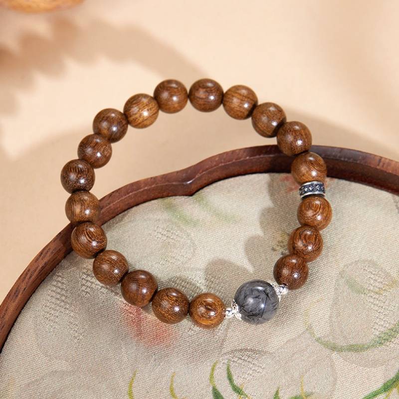 Grounded Confidence Sandalwood Bracelet - Clarity • Spirituality • Harmony - prop-styled shot 2