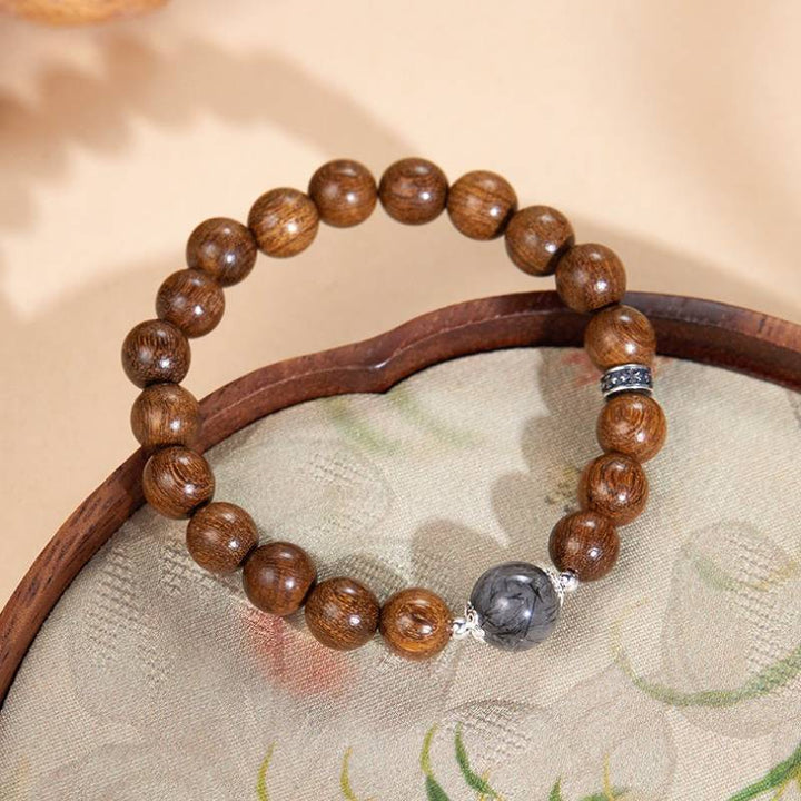 Grounded Confidence Sandalwood Bracelet - Clarity • Spirituality • Harmony - prop-styled shot 2