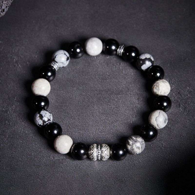 Grounded Elegance Bead Bracelet - Depth • Resilience • Style - Staged shot of black obsidian and map stone  bracelet