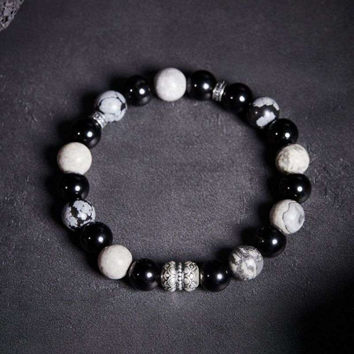 Grounded Elegance Bead Bracelet - Depth • Resilience • Style - Staged shot of black obsidian and map stone  bracelet