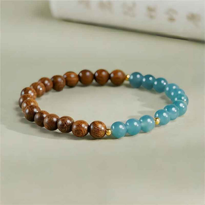 Grounded Harmony Sandalwood And Jadeite Bead Bracelet - Clarity • Prosperity • Spirituality - staged shot