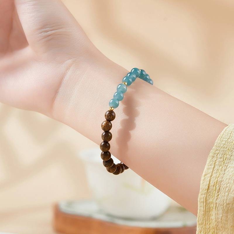 Grounded Harmony Sandalwood And Jadeite Bead Bracelet - Clarity • Prosperity • Spirituality - on-wrist shot