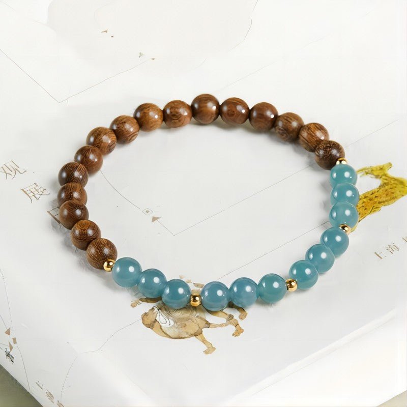 Grounded Harmony Sandalwood And Jadeite Bead Bracelet - Clarity • Prosperity • Spirituality - top view shot