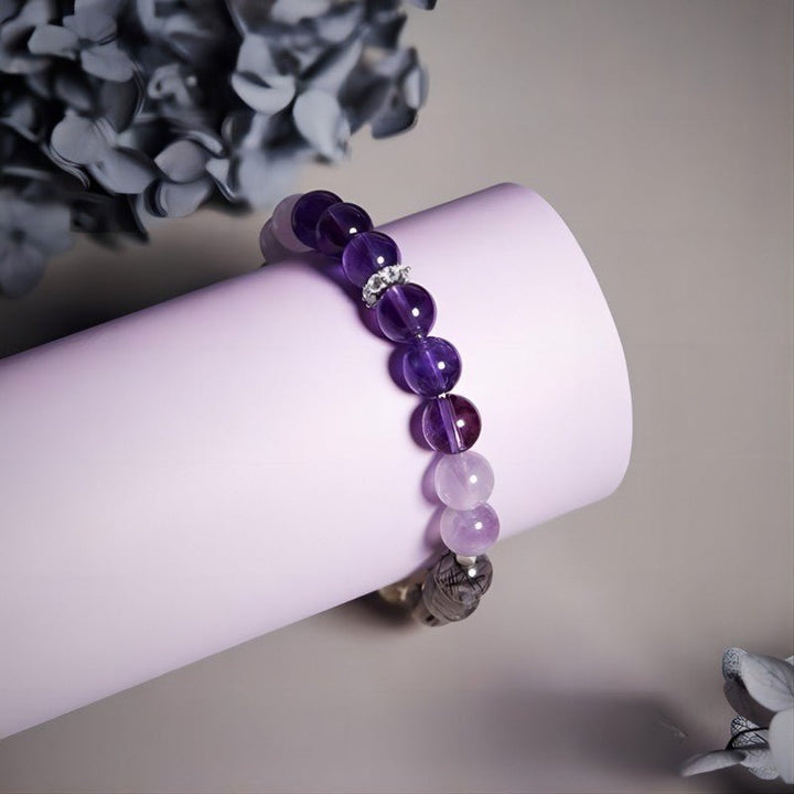 Grounded Harmony Crystal Bracelet - Clarity • Wealth • Protection - wearing display shot