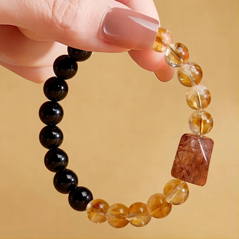 Grounded Harmony &amp; Wealth Black Obsidian And Citrine Bracelet - Protection • Clarity • Prosperity - on-hand shot