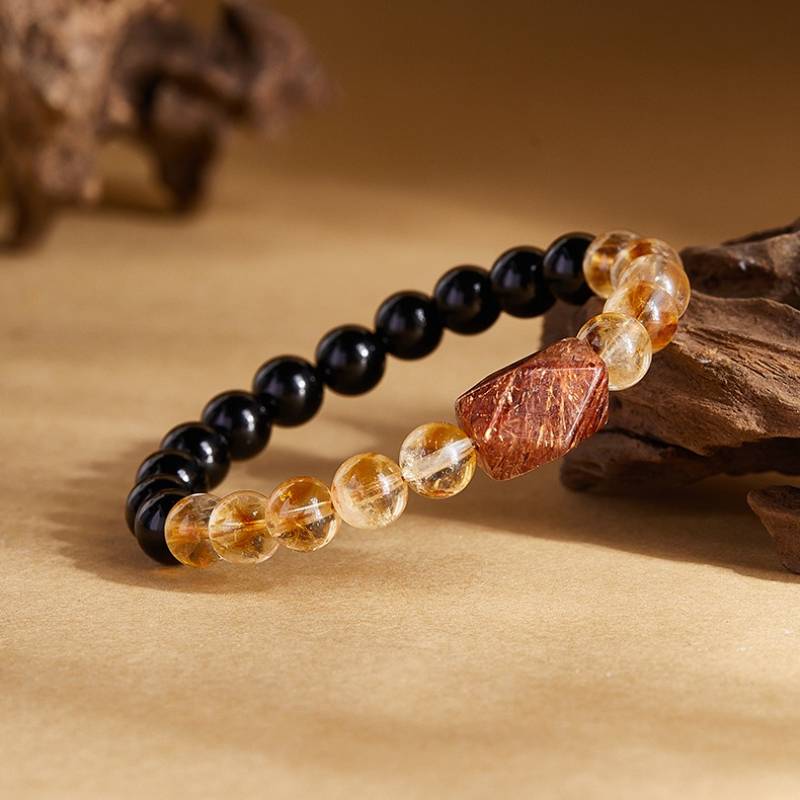 Grounded Harmony &amp; Wealth Black Obsidian And Citrine Bracelet - Protection • Clarity • Prosperity - side view staged shot