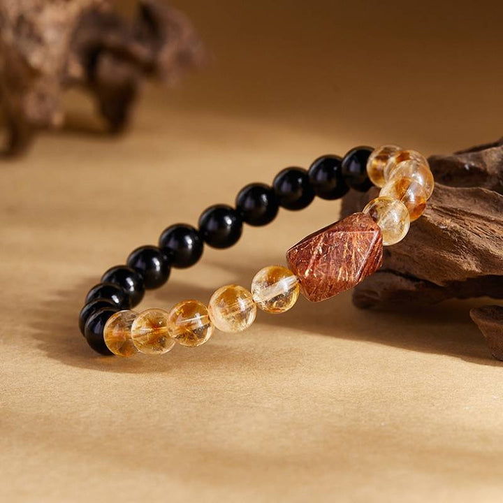 Grounded Harmony &amp; Wealth Black Obsidian And Citrine Bracelet - Protection • Clarity • Prosperity - side view staged shot