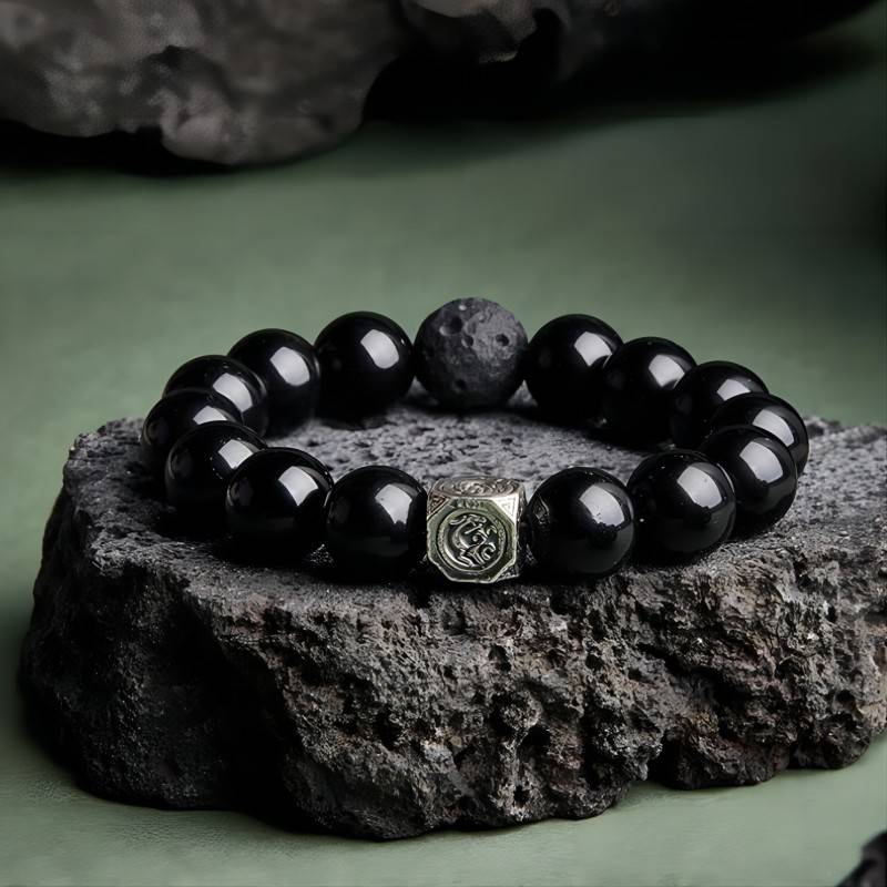Grounded Protection Obsidian Bracelet - Staged shot with silver focal bead