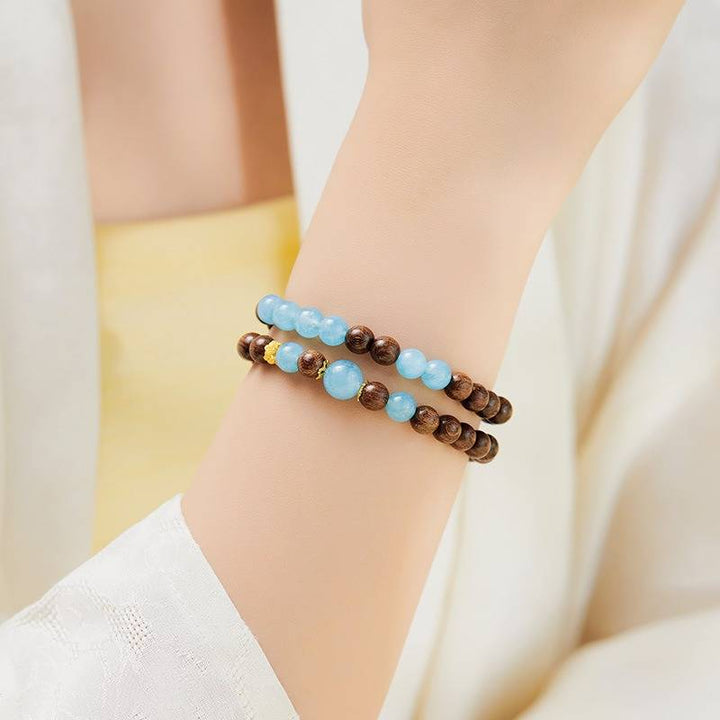 Grounded Serenity Double Wrap Sandalwood And Aquamarine Bracelet - Clarity • Communication • Harmony - on-wrist shot
