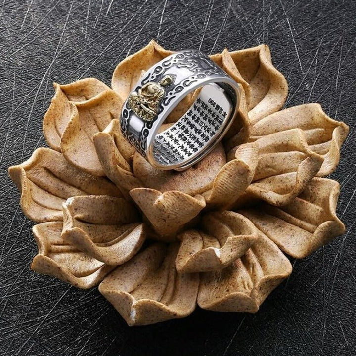Guardian Chinese Zodiac Buddha Adjustable Ring - Good Fortune &amp; Calm - Prop styling shot of sterling sliver ring