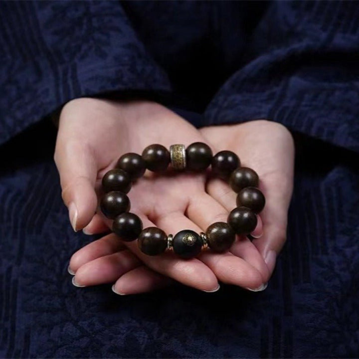 Guardian Chinese Zodiac Buddha Bracelet - Peace &amp; Smooth Fortune - on-hand shot with agarwood main beads