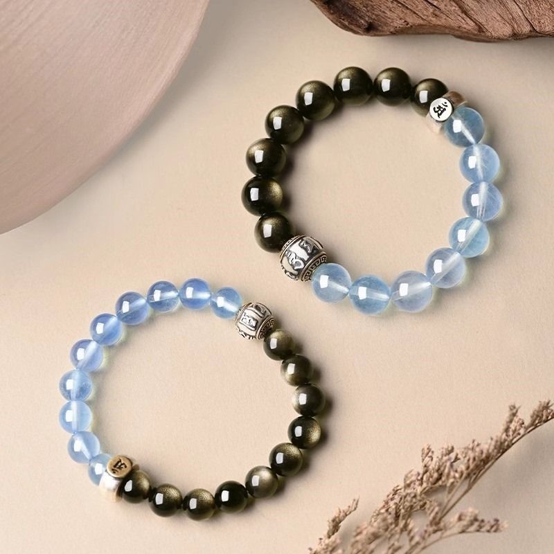Guardian Mantra & Zodiac Buddha Double Blessing Bracelet - Stage shot of  black obsidian and Aquamarine bracelets 2