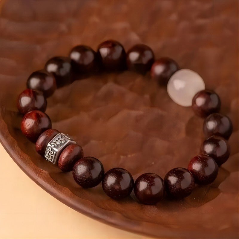 Guardian Sanskrit Zodiac Charm Aromatic Sandalwood Bracelet - Peace & Smooth Fortune - prop-styled shot