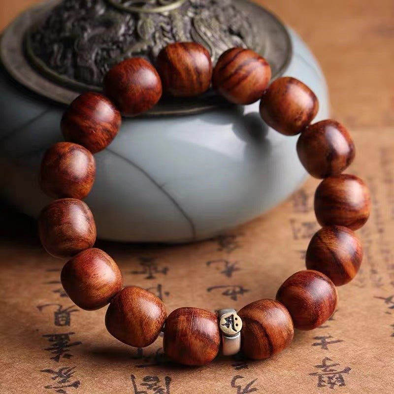 Guardian Sanskrit Zodiac Charm Natural Rosewood Bracelet - Peace & Smooth Fortune - prop-styled shot