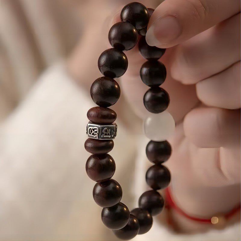 Guardian Sanskrit Zodiac Charm Aromatic Sandalwood Bracelet - Peace &amp; Smooth Fortune - close-up on-hand shot