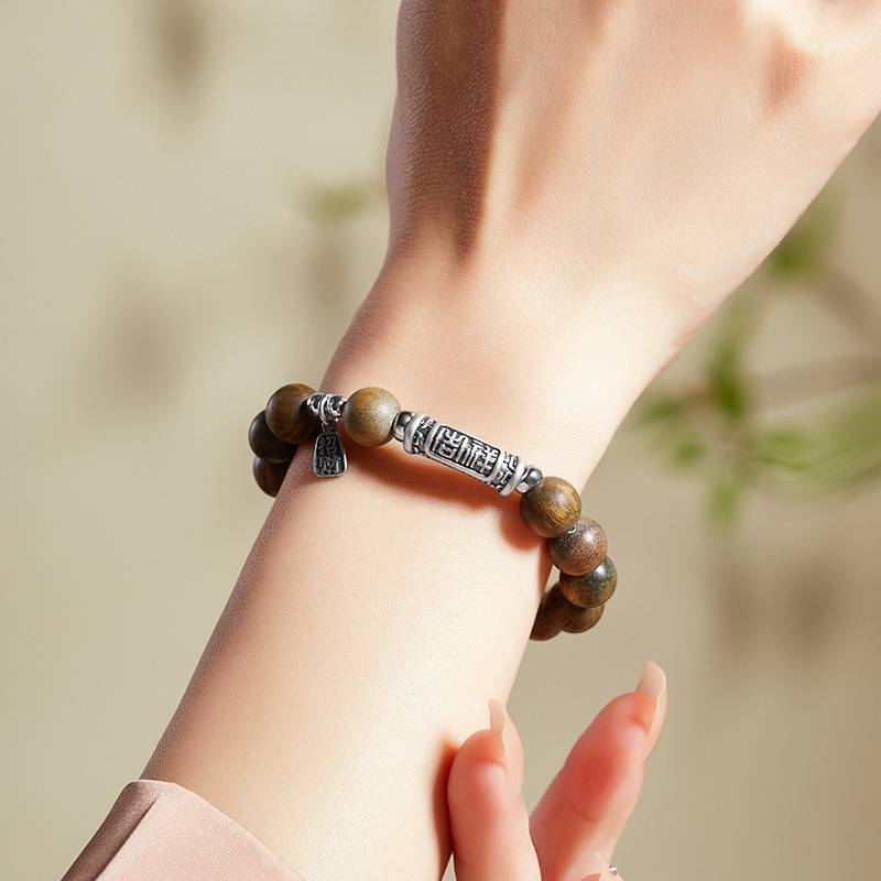 Harmony &amp; Fortune Sandalwood Bracelet With Auspicious Text Charm - on-wrist shot