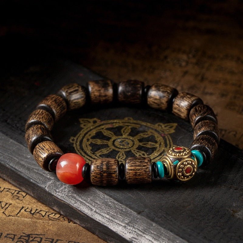 Indonesian Agarwood Barrel Bead Bracelet With Red Agate & Nepal Bead - Calm & Grounded - staged shot