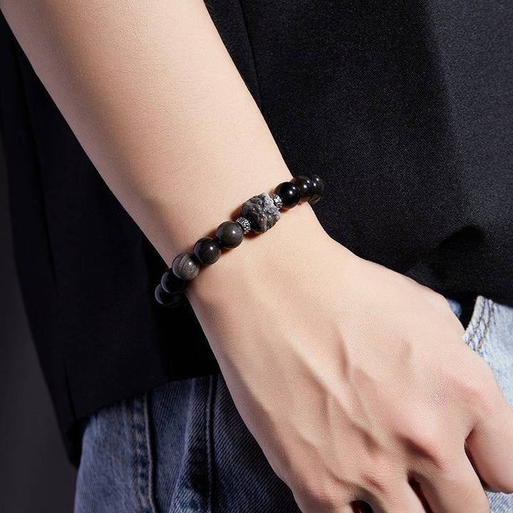 Lion Head Silver Sheen Obsidian Bracelet - Protection &amp; Bold Style - On wrist shot of golden sheen obsidian bracelet