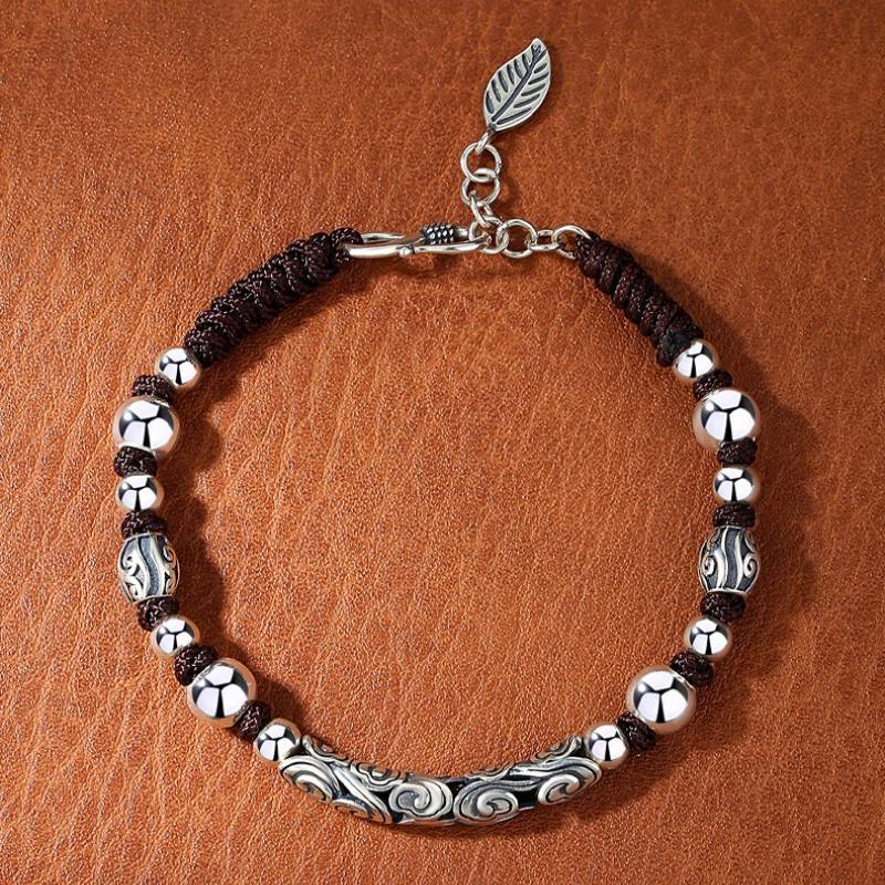 Lucky Cloud Silver Adjustable Braid Cord Bracelet - Harmony &amp; Flow - top view staged shot